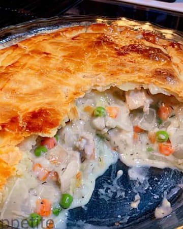 he chicken pie recipe is loaded with flavor. This chicken pie is quick, it's made with fillings that are easy to prepare and with a store-bought puff pastry. Buying a store-bought puff pastry means that the only thing you'll have to do is make the filling. The filling is made with a bunch of vegetables and chicken or meat.