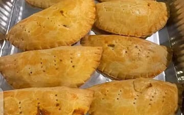 Meat pie or beef pie is a pie stuffed with minced meat and vegetables like potatoes, carrots, and green beans and flavored with seasoning such as beef stock, black pepper, etc. Meat pie recipe come in many variations from a kidney pie, to a shepherd's depending on the country of origin.